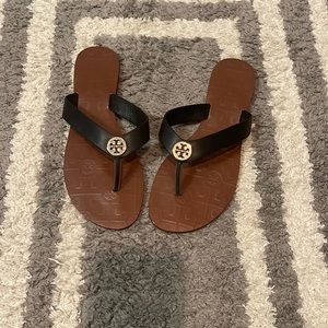 Tori Burch black flip flops size 7